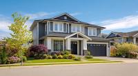 Beautiful suburban family home with landscaped yard representing FHA home purchase loan, refinance for home improvements, home equity refinance, USDA home financing, and new homeowner mortgage programs for families seeking affordable homeownership and residential financing solutions.