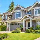 Suburban two-story home representing First home financing programs, rental home financing, veteran homeownership financing, FHA loan eligibility, and adjustable rate refinance options.