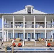 Luxury waterfront home representing FHA refinance options, mortgage application, refinance existing mortgage, investment property cash out refinance, and mortgage rate comparison solutions.